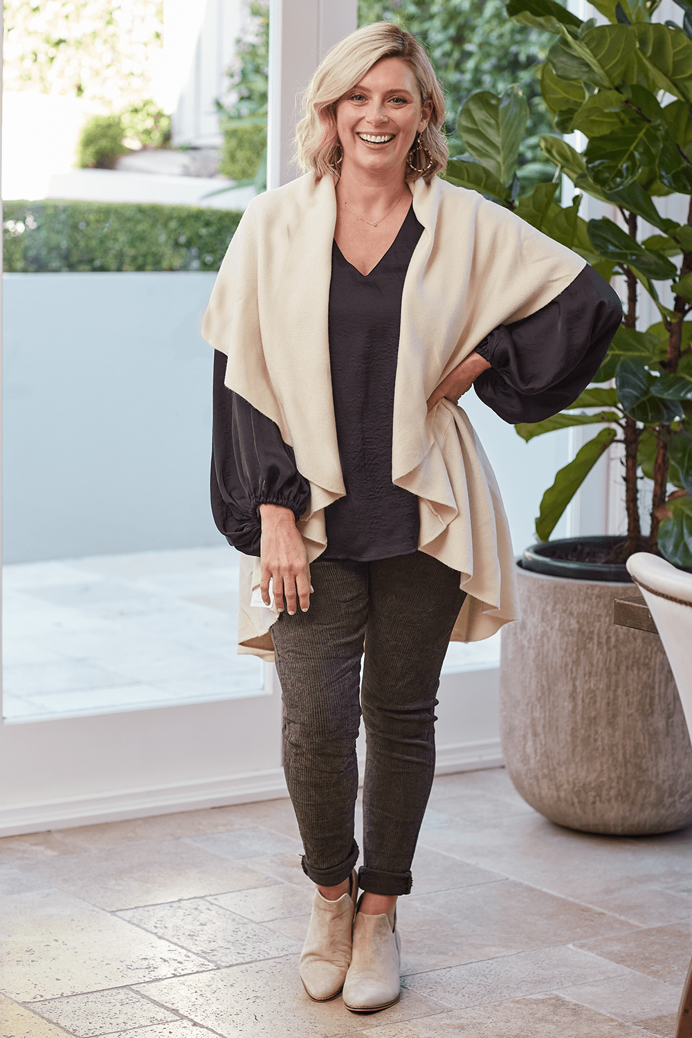 Melanie Sleeveless Cape Ivory Knitwear