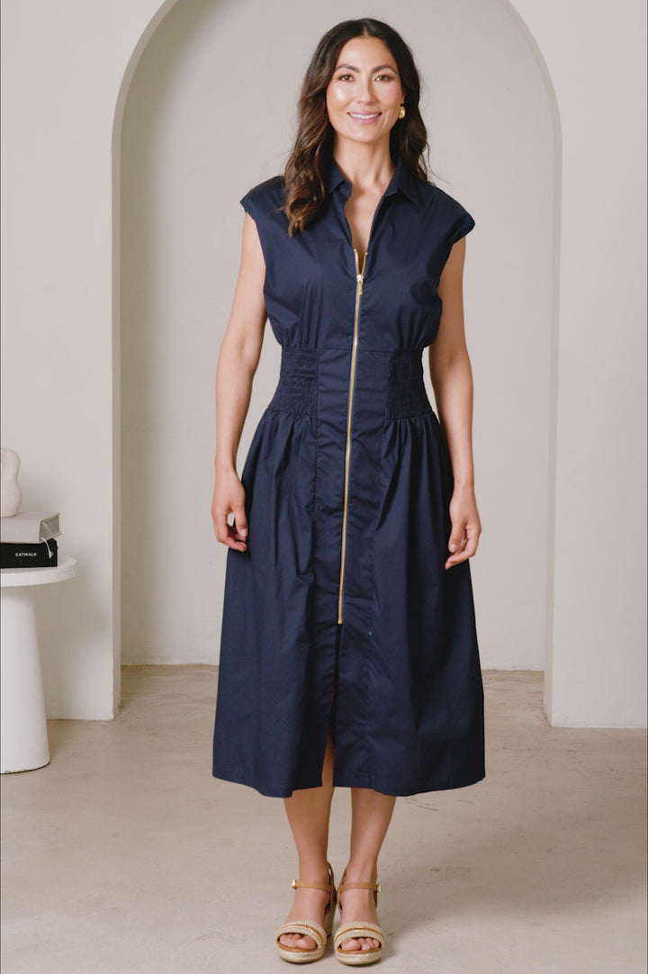 Laura Sleeveless Smocked Waist Zip Front Midi Dress Navy product video by Carolina