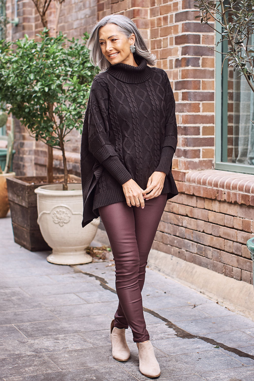 Poncho style jumper with sleeves best sale